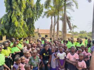 Uchenna with the school children